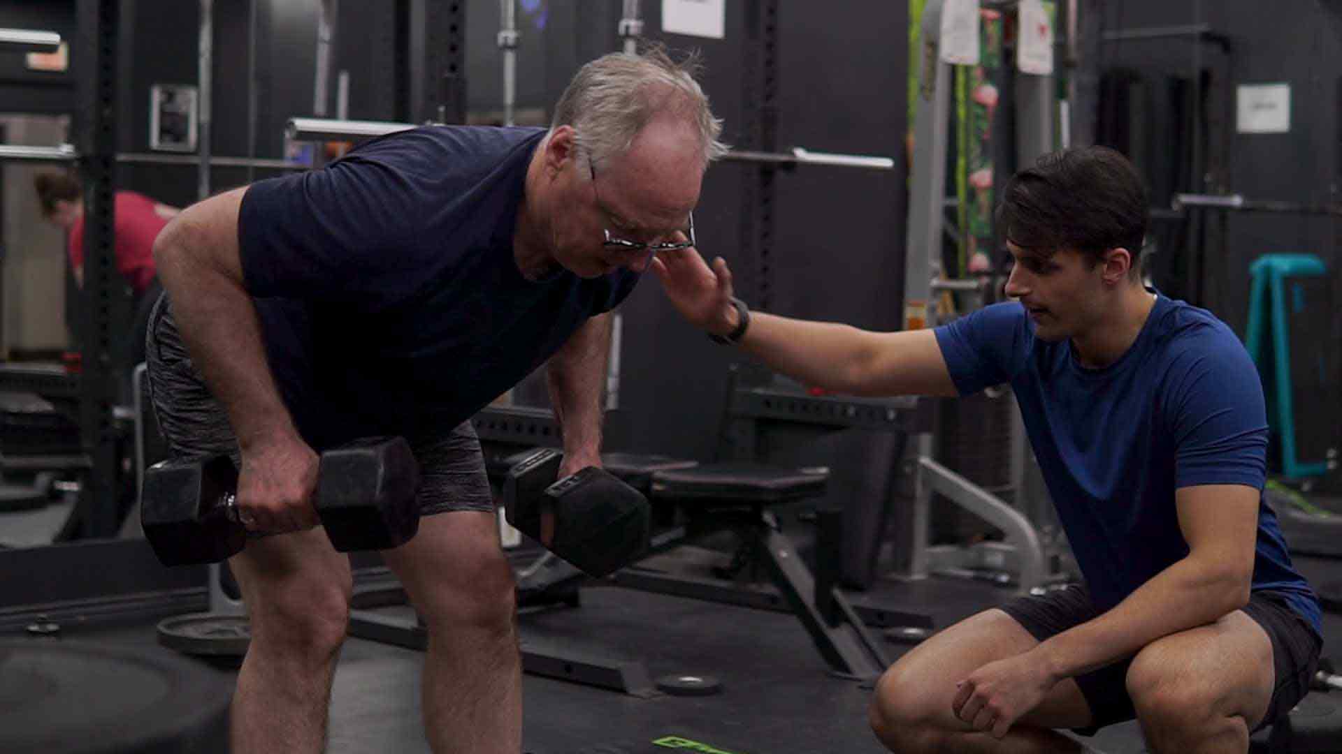 Groundwork Athletics coach training with a member